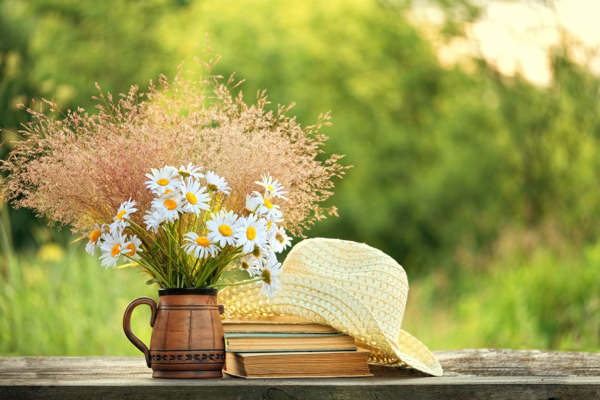Flowers,Bouquet,,Old,Books,And,Braided,Hat,On,Table,In